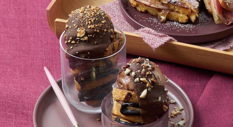Two desserts on a plate on a table