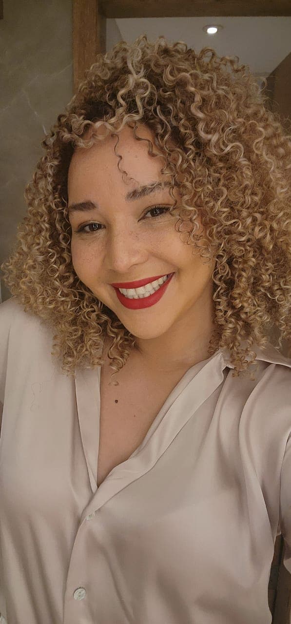 A close up of a person with a smile on their face