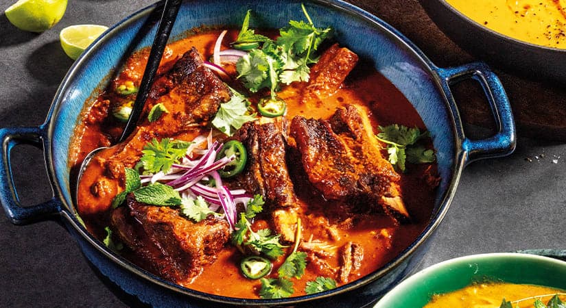 A bowl of soup and a bowl of soup on a table